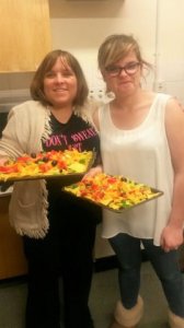 Learners with some of the healthy food they have prepared on their Food Safety training course